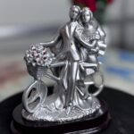 Cycle couple decorative showpiece adding charm and romance to home décor