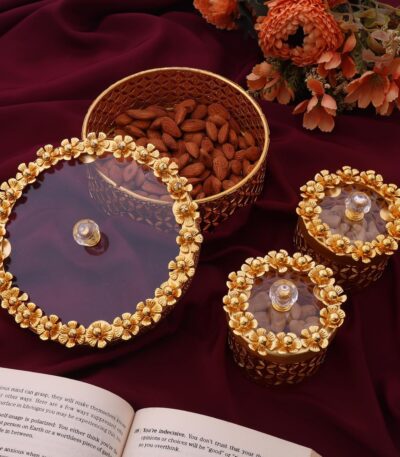 Luxury dry fruit storage jars with decorative golden floral lids