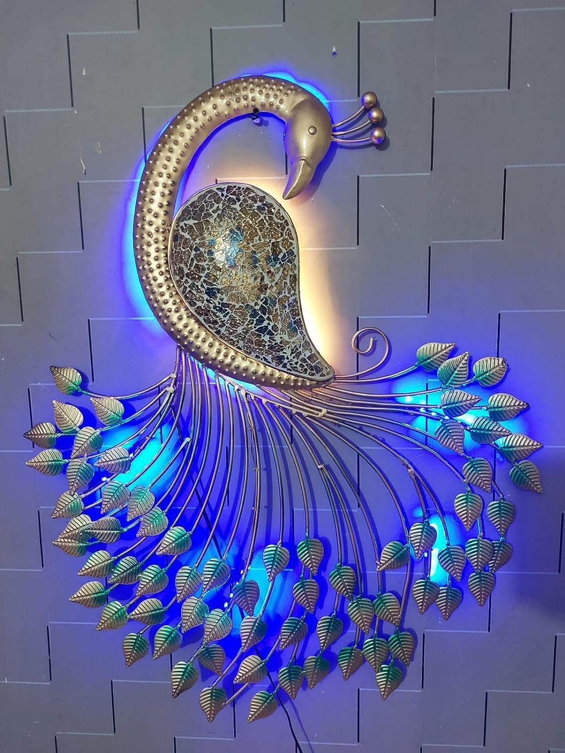 Artistic handcrafted peacock wall décor with LED lighting for elegant interiors