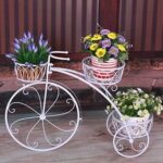 Vintage tricycle flower pot stand for garden decoration