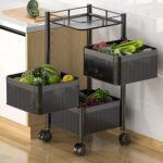 Three layered floor standing rotating vegetable rack for organised kitchen storage