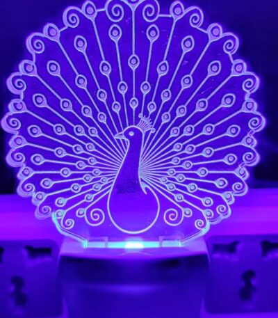 Decorative peacock night lamp featuring multicolor LED lighting