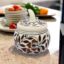 Handcrafted brown floral ceramic condiment jar with lid