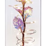 Glowing LED galaxy rose displayed inside a clear decorative dome with gold stem