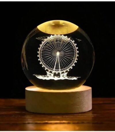 3D crystal ball lamp glowing on wooden base for home decoration