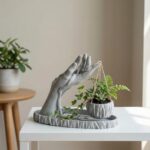 Artistic hand sculpture planter with hanging pot for indoor décor