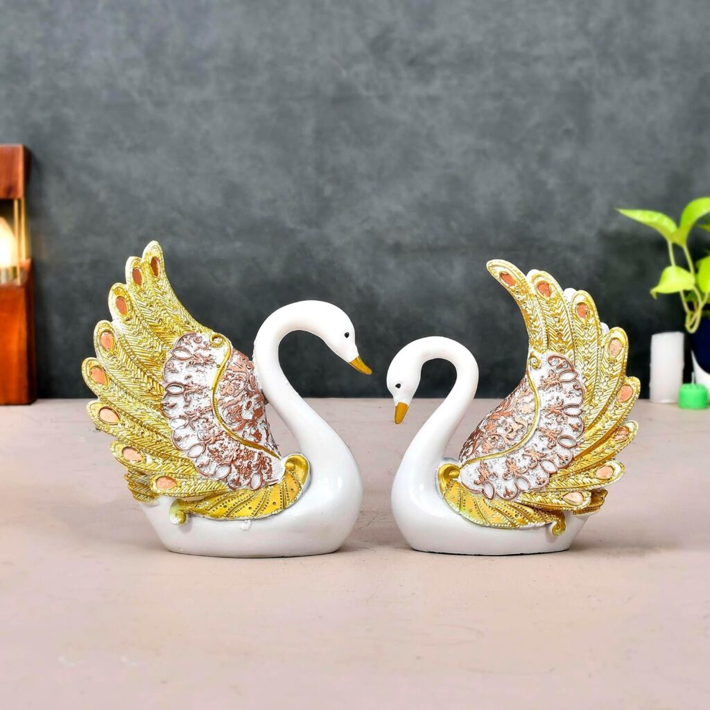 Decorative swan couple statue with feather detailing for living room