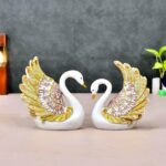 Decorative swan couple statue with feather detailing for living room