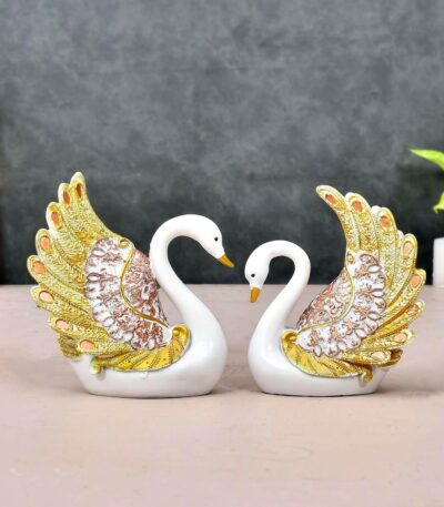 Decorative swan couple statue with feather detailing for living room